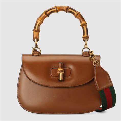 gucci bamboo suede fringe bag|Gucci bamboo bag.